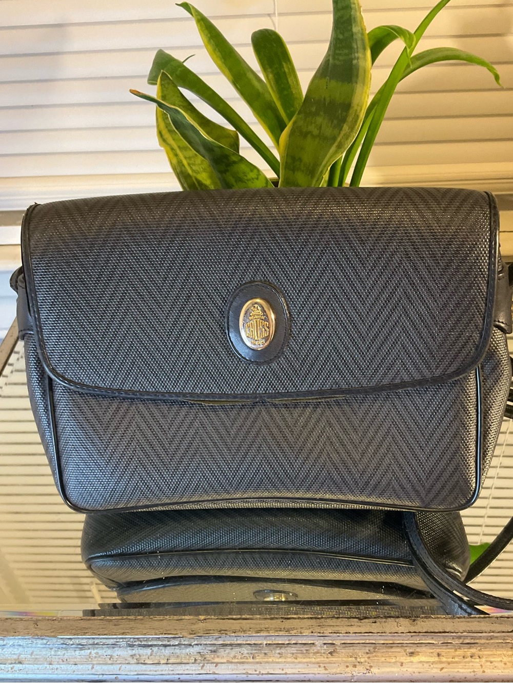 Vintage Classic Black Crossbody Bag with Chevron Texture and Medallion Accent